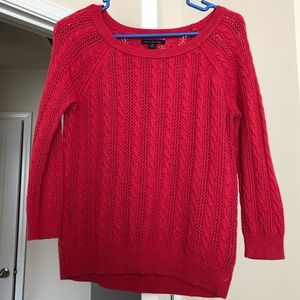 Red women’s American Eagle sweater, size M